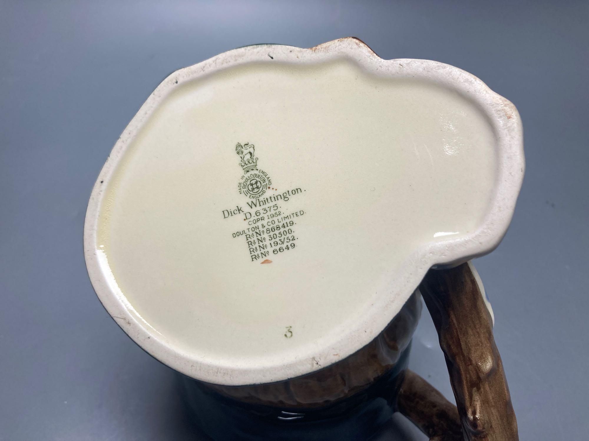 Royal Doulton John Barleycorn large and small character jugs, two Royal Doulton Pickwick and Old Mac tiny character jugs, Royal Doulton